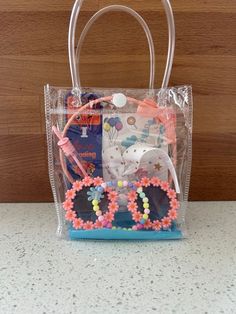 a clear plastic bag filled with lots of items