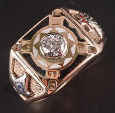 Vintage 1940's 10k Yellow White Gold Diamond Knights Templar Masonic Ring .37ct Metal Information: 10k Yellow White Gold Total Weight: 8.73g Band Width: 4.0mm Size: 9.75 Circa: 1940's Stone Information Main Stone Gem Type: Diamond Shape: Transitional Round (4.5mm) Color: H Clarity/Quality: VS2 Carat Weight: .37ct Number of Stones: 1 Total estimated ctw (carat total weight): .37ctw Estimated Retail Price: $1965.00 OUR PRICE: $1570.00 Sizing Many of our pieces can be re-sized at the buyers request. Please email us if you require our skilled professional services. 46101 Vintage Jewelry With Diamond Accents For Collectible, Collectible 14k Gold Jewelry With Brilliant Cut, Antique Collectible Diamond White Jewelry, Antique Jewelry Rings, Masonic Ring, Professional Services, Diamond Shape, White Gold Diamonds, Rings Statement