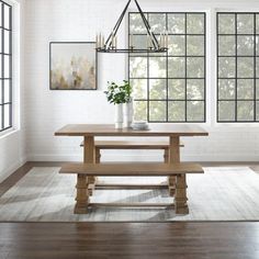 The Crosley Joanna 3 pc. Dining Set brings the rustic beauty of modern farmhouse design to your dining room. Featuring a large rectangle trestle table and two dining benches, this seating set has a casual charm perfect for a family meal. The benches echo the design of the trestle table with square pedestal columns and large rectangular seats. With seating for up to six diners, this wooden dining set is ideal for a dinner party or a game night. The rustic brown finish of this table and bench set Farmhouse Dining Set, Modern Farmhouse Table, Dining Table Dimensions, Table And Bench Set, Wooden Dining Set, 3 Piece Dining Set, Kincaid Furniture, Grande Table, Modern Farmhouse Design