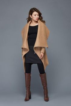 This is a chic brown wool coat, a large collar, an asymmetric hem, and a diagonal zipper. Each characteristics is attractive, and most women's can't resist it.FEATURESWool blend, 50% Wool, 50% polyesterLong sleeveSide pocketDiagonal zipper, snap closureAsymmetrical hemPerfect for winter, autumnMore colorSIZEAvailable in sizes XS-XXLHow to choose size ?1.Check your body measurement with instructionshttps://www.etsy.com/listing/7940540802.Get your size in Size Chart with your body measurementhttps Long Beige Outerwear For Winter, Beige Winter Sweater Coat, Beige Long Outerwear For Winter, Beige Solid Color Sweater Coat For Winter, Oversized Beige Shawl Collar Outerwear, Long Beige Sweater Coat For Winter, Trendy Long Sweater Coat For Winter, Beige Long Sweater Coat For Winter, Oversized Shawl Collar Outerwear For Winter