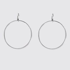 Large hoop earrings hang from an ear wire , swingy, modern, plain and sleek -approx.- 2" diameter-french ear wire-EJ2050 Modern Nickel-free Open Circle Hoop Earrings, Modern Metal Open Circle Hoop Earrings, Modern Metal Earrings With French Hook, Modern Hoop Earrings With French Hook, Everyday Silver Hoop Earrings With French Hook, Modern Hoop Drop Earrings With French Hook, Modern Hypoallergenic Open Circle Earrings, Modern Round Earrings With Lever Back, Silver Hoop Earrings With French Hook