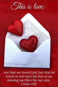 two red hearts in an envelope with the words, this is love bible notes not that we loved god, but that he loved us and sent his son as an