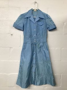 Good Condition. Small Stains. No Size Tag. Length- 43.5in. Pit to pit- 18.5in. Waist- 28in. Fitted Retro Vintage Dress With Button Closure, Blue Vintage Dress With Buttons For Vintage Fashion, Blue Vintage Dress With Buttons, Retro Blue Button-up Dress, Retro Blue Knee-length Vintage Dress, Blue 1950s Style Vintage Summer Dress, 1950s Style Blue Vintage Dress For Summer, Fitted Retro Button-up Vintage Dress, Retro Fitted Button-up Vintage Dress