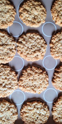 several cookies with icing sitting on top of each other