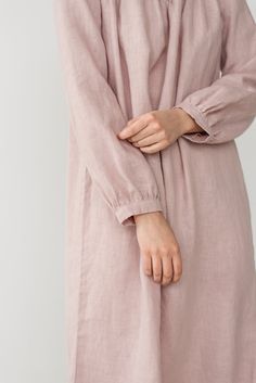 "MONA gather dress made from soft linen in dusty pink. - length is ± 107 cm (42\") (depends on size) - gathered front, back and sleeves - loose fit - without pockets DETAILS: - 100 % European, pre-washed medium weight linen (205 g/m²) - the model is 176 cm (5′9″) high, wearing size S. - model measurements: bust 83 cm (33\") / waist 61 cm (24\") / hips 90 cm (36\") - color in the picture - dusty pink (you can choose other color on the right) MADE TO ORDER: All pieces are made to order, it will ta Feminine Long Sleeve Sleep Dress, Feminine Long Sleeve Dress For Sleepover, Pink Dress With Gathered Sleeves For Daywear, Feminine Long Sleeve Loungewear Dresses, Feminine Long Sleeve Dresses For Loungewear, Gather Dress, Nightgown Long, Linen Sleepwear, Abaya Designs Latest