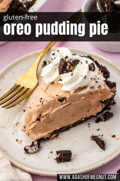 a slice of oreo pudding pie on a plate with a fork