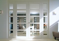 an open white door leading into a living room