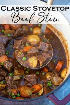 a ladle full of beef stew with potatoes and carrots is being spooned into the pot