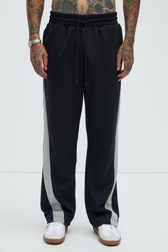 Available In Black. Relaxed Fit Elastic Waist Drawstring Side Pockets Back Pockets 100% Polyester Imported | Mens Hopper Relaxed Track Pants in Black size Small by Fashion Nova Black Functional Joggers With Pockets, Black 4-way Stretch Athleisure Sweatpants, Urban Black Full-length Sweatpants, Black Sporty Full-length Joggers, Black 4-way Stretch Joggers With Pockets, Service Women, Bottom Clothes, Track Pants, Bottoms Pants