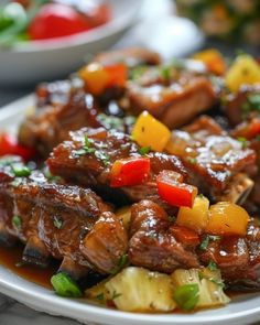 a white plate topped with meat and vegetables