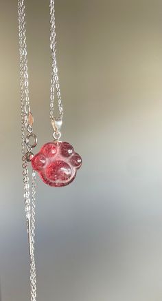 This is made with natural Strawberry Quartz and shipped from United States  Pendant Size: 12-14mm approx Chain Length: 18 inches Material: Natural Strawberry Quartz  ❤️All gemstones are Cleaned ❤️ I cleanse it under the natural CRYSTAL CAVE or by Sunlight. After you get it, you can also use Sunlight or Moonlight to cleanse it ❤️Healing Properties❤️ This mineral stimulates the energy center of the heart bringing love throughout all of the bodies.  Provides for the euphoria of a true loving enviro Paw Print Pendant Necklace For Gift, Paw Print Pendant Necklace Gift, Round Pendant Necklace With Paw Print For Gift, Paw Print Necklaces For Valentine's Day Gift, Valentine's Day Gift Necklaces With Paw Print, Paw Pendant, Crystal Cave, Carved Heart, Strawberry Quartz