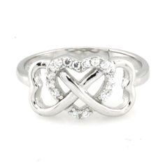 "* Hypoallergenic solid 925 Sterling Silver. Rhodium plated for extra durability and tarnish resistance. * Our CZ Infinity Rings feature a large Infinity symbol at the crown, with a Cubic Zirconia lined heart at the center. * The band is approximately 2.15mm wide while the Infinity sign dimension measures 9mm x 16 mm Personalized Details ~ To ensure faster processing, please select the \"Text Engraving Option\" from the available drop down menu to have your order engraved so that orders can be s Silver Cubic Zirconia Infinity Ring, Sterling Silver Infinity Rings For Valentine's Day, Sterling Silver Infinity Heart Promise Ring, Hypoallergenic Silver Cubic Zirconia Ring, Silver Infinity Ring For Valentine's Day, Elegant Nickel Free Heart Promise Ring, Elegant Nickel-free Heart Promise Ring, Silver Hypoallergenic Infinity Ring, Silver Hypoallergenic Heart Ring For Promise