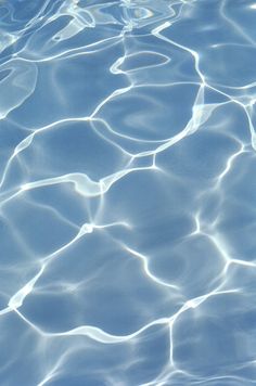 water ripples on the surface of a swimming pool