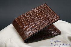 Introducing a meticulously handcrafted wallet made from genuine alligator leather with exquisite French chevre lining. This unique wallet combines texture, reliability, and timeless beauty that only genuine alligator leather can offer. The soft and thin French Chevre leather adds an extra touch of luxury and comfort to this exceptional piece. Dimensions: When closed: 3.3 x 4.4 inches (perfectly compact for everyday use) Function: This wallet is designed to meet your essential needs while maintai Unique Wallets, Stitching Techniques, Leather Keyring, Clip Wallet, Money Clip Wallet, Luxury Accessories, Leather Items, Cloth Bags, Card Wallet