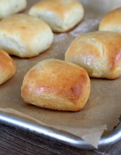 bread rolls on a baking sheet ready to be baked