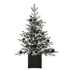 a white christmas tree with red berries and pine cones in a black pot on a white background