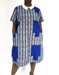 Stylish Ankara shift dress with Peter Pan collar and invisible pockets. Collared Cotton Mini Dress With Pockets, Collared Mini Dress With Pockets For Work, Patchwork Shift Dress For Work, Collared Shift Dress For Work, Collared Shirt Dress For Work With Pockets, Workwear Shirt Dress With Pockets And Collared Neckline, Blue Collared Shirt Dress With Pockets, Brown Short Sleeve Shirt Dress For Work, Brown Patchwork Dress For Work