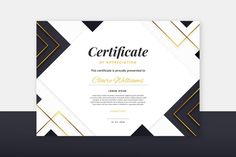 a certificate with black and white geometric shapes