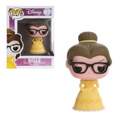 a pop vinyl figure wearing glasses and a yellow dress