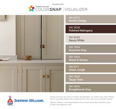 the color scheme for this kitchen cabinet is neutral and white, with brown trim on the doors