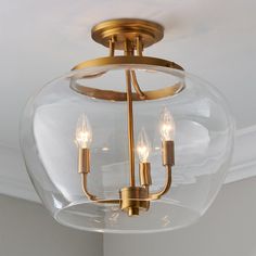 a light fixture hanging from the ceiling in a room