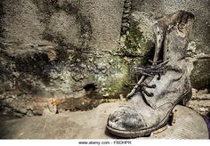 Abandoned Shoe By Rock - Stock Image Old Shoes, Stock Photography, Combat Boots, Photo Image, Vector Illustration, Stock Images, Stock Photos, Boots, Photography