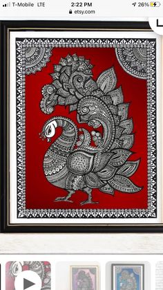 a red and black art piece with an ornate design on the bottom right hand corner