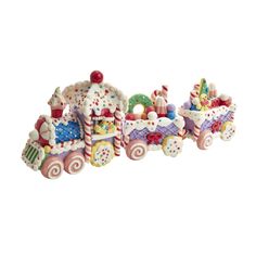 a close up of a toy train with lots of decorations on the front and sides