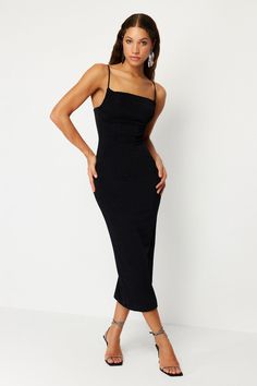 Step into timeless elegance with our Black Strappy Midi Dress, designed to accentuate your silhouette and elevate your style. This sleek and sophisticated dress features delicate spaghetti straps and a figure-hugging fit that flatters your curves from every angle. Made from a premium stretch fabric, it offers ultimate comfort and ease of movement, perfect for any occasion, whether it’s a cocktail party, date night, or a special event. The versatile black color makes it a classic wardrobe essential that you can dress up or down with ease. Pair it with your favorite heels or accessories to create a chic, unforgettable look. • Black strappy midi dress • Women’s black cocktail dress • Elegant black dress for women • Bodycon midi dress • Figure-hugging black dress • Stretchy black evening dress Dress With Flat Sandals, Black Dress For Women, Dress With Flats, Cocktail Dress Elegant, Classic Wardrobe Essentials, Midi Dress Elegant, Bodycon Evening Dress, Black Evening Dress, Strappy Midi Dress