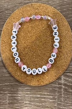 a beaded bracelet with the words be yourself on it