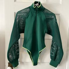 Adidas X Ivy Park Bodysuit. Green. Mesh Sleeves. One Sleeve Has “Ivy” The Other Sleeve Has “Park”. Adidas Trefoil Logo On Cuff. Quarter Zip. Button Bottoms. Super Super Cool! Size Small. Nwot. Green Bodysuit, Adidas Trefoil, Ivy Park, Green Park, Mesh Sleeves, Ivy, Dance Costumes, Quarter Zip, Adidas