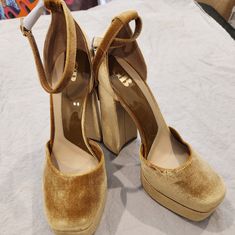 The Gianni Bini Runway Pumps Feature A Mustard Yellow Gold Velvet Design With An Ankle Strap. These Heels Add A Trendy Touch And A Retro Twist To All Of Your Outfits! Details: * Velvet Upper * Closed Toe * Ankle Strap With Adjustable Buckle Strap * Synthetic Lining * Synthetic Outsole * Platform Measures Approximately 1.2” * Heel Measures Approximately 4.1” * New Without Tags/Box * Size 10 Platform Pumps Heels, Velvet Design, Pump Heels, Gold Velvet, Gianni Bini, Platform Pumps, Mustard Yellow, Ankle Strap, Mustard