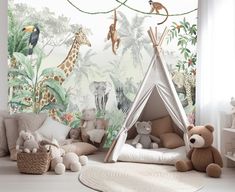 a child's room with jungle wallpaper and stuffed animals on the floor, including a teepee tent