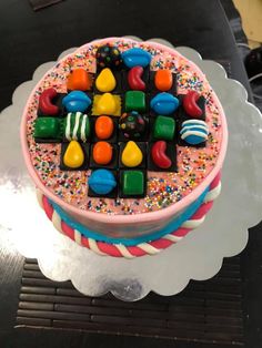 a birthday cake decorated with candy and candies