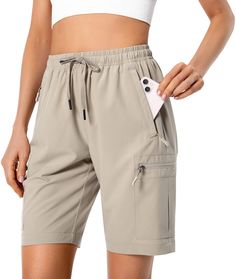 PRICES MAY VARY. Lightweight & Quick Dry Fabric: Lightweight, breathable, quick-dry and water-resistant fabric. The womens hiking shorts keep you cool and fresh all day. Adjustable Elastic Waistband: The women cargo shorts have a 360-degree elastic waist with adjustable drawstring to prevent pressure marks on the tummy and offers a custom fit during hiking or athletic. 5 Zipper Pockets: 2 Zipper side pockets, 2 zipper cargo pockets and 1 zipper rear pocket are deep enough to store your cellphone Womens Hiking, Pull On Shorts, Hiking Shorts, Women Cargos, Hiking Women, Water Resistant Fabric, Moisture Wicking Fabric, Athletic Shorts, Custom Fit