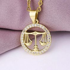 Libra Zodiac Pendant Necklace Libra September 24-October 23 Balance Condition New Size Approximately Pendant Just Over 0.5" Diameter Chain 17" + Just Under 2" Extension The Image With Penny Is To Show Size. Color The Actual Color & Sparkle Are Better Represented In The Stock Photos. Material Inlaid Zircon Gold Plated Stainless Steel About Me I Usually Accept Reasonable Offers Unless I'm At My Bottom Price. Same Or Next Business Day Shipping. 1000+ Sales With 5 Star Rating Average. 300+ Listings Libra Jewelry, Libra September, Taurus April, Libra Constellation, Zodiac Pendant Necklace, Festival Theme, 23 August, Zodiac Signs Aries, 24 October