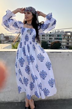 "DESCRIPTION blue boota floral printed long maxi dress / square neckline with smocked summer maxi dress / long sleeve boho maxi dress Indian (Jaipur) Traditional Hand Block Printed Dresses for summer vacations, beaches wear, party wear, and more occasions to wear this dresses. PRODUCT DETAILS: Long sleeve, square neck, Long dress FABRIC: soft and breathable cotton cambric WASH CARE:  wash in cold water, air dry in shade.. SLEEVE LENGTH - 22 inch Size chart is mentioned in images. Size chart is g Bohemian Smocked Dress With Elastic Sleeves, Spring Maxi Dress With Smocked Bodice And Straight Neckline, Billowy Maxi Dress With Smocked Back, Printed Square Neck Maxi Dress For Spring, Spring Printed Maxi Dress With Square Neck, Bohemian Long Maxi Dress, Blue Square Neck Maxi Dress With Smocked Back, Blue Maxi Dress With Smocked Back And Square Neck, Bohemian Flowy Maxi Dress With Smocked Cuffs