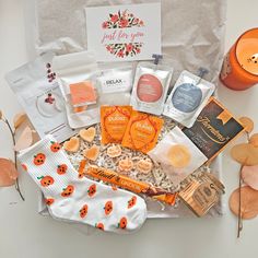 Indulge in self-care this Halloween with our Halloween self-care hamper. Treat yourself or a loved one, Limited availability, get yours now! INCLUDED IN EACH BOX: - Pumpkins socks - Face mask sheet - Eco Spa treatment Body lotion - Eco Spa Treatment Hair Conditioner  - 100 gr Luxury bath salts pouch - Handmade Pumpkin Spice mini bath bomb hearts - Handpoured Halloween wax melts - Spiced Pumpkin - Spiced orange scented candle in glass jar - Luxury Hot chocolate sachet  - Lindt Orange milk chocolate bar - 2 organic Three Ginger teabags - 1 Fully personalisable handwritten card: choose between 24 card designs or a plain white card  Don't hesitate to contact us if you want any specific items to be replaced, we have plenty of alternatives. *We have handmade shower steamers in stock for people w Halloween Self Care, Halloween Wax Melts, Coconut Face Mask, Orange Scented Candle, Halloween Gift Baskets, Gift Box For Her, Hamper Gift, Pamper Hamper, Spa Gift Box