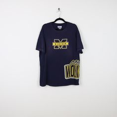 Tag: NCC Apparel Size: XL Pit to Pit: 26' Length: 32' 90s Crew Neck T-shirt For Fan Gear, 90s Style T-shirt For Fan Gear With Crew Neck, 90s Style Crew Neck T-shirt For Fan Gear, 90s Blue T-shirt For College, 90s Style Blue T-shirt For College, Blue Graphic, University Of Michigan, Michigan Wolverines, Print Tee