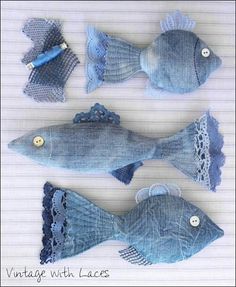 three fish made out of old jeans and laces