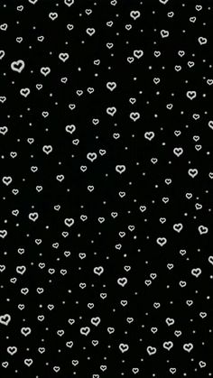 black and white hearts wallpaper with lots of small dots on the left side of the screen