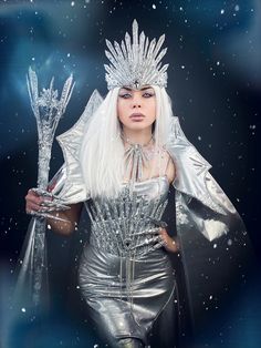 The sparkling silver color crown with rays is richly decorated with glass rhinestones for the image of the Snow Queen, Ice Queen, Winter Fairy. This amazing crown can be purchased separately and comes complete with a necklace, belt, wand, cape with hex and rhinestones, and claws. It will be a great addition to a festive outfit for a Christmas party or New Year's Eve. It will be a great addition to winter photography. 100% designed and handmade by our designers ( SETA Design studio in Kyiv). It w Winter Fairy Costume, King And Queen Costume, Ice Crown, Snow Queen Costume, Fairy Tiara, Ice Queen Costume, Ice Queen Makeup, King Crowns, Ice Fairy