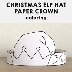 a paper crown with the words christmas elf hat coloring on it, and an image of a