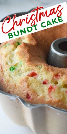 a bundt cake in a pan with a christmas sticker on it's top