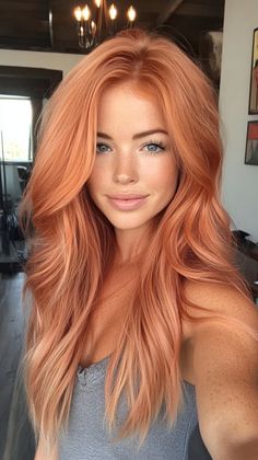 Glow with beauty with peachy copper waves that add warmth to your look. Visit our site for more inspiration on how to achieve this glowing transformation. Don’t forget to save this pin for your next salon visit! Peach And Copper Hair, Copper Hair With Pink Money Piece, Copper Hair With Fashion Colors, Red Waves, Wild Hair Color Ideas, Peach Hair Color Ideas, Peachy Copper Hair, Copper Hair Colour, Copper Hair Ideas