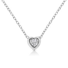 Haven’t we all had the dream of getting ready like a queen for that special day. This heart shaped diamond pendant necklace is designed for that queen in you. This 10k white gold pendant is studded with a single 1/10 carat round-cut diamond and is a magnificent sight behold and beautiful adornment for your neck. The diamond is set in a miracle plate for a bigger look and sparkle. This minimalist pendant goes well with all your outfits and the best thing about the shape, style and look of this necklace is that you can wear in with any attire of your choice. And irrespective of the outfit and the occasion, you are going to shine. This petite and darling necklace is a must have in your jewelry box. Heart Shaped Diamond Pendant, White Gold Pendant Necklace, Diamond Heart Pendant Necklace, Heart Shaped Pendant Necklace, Heart Shaped Necklace, White Gold Pendant, Heart Pendant Gold, Heart Shaped Diamond, Heart Pendant Diamond