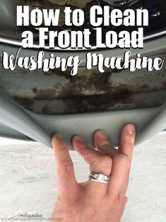 someone is holding their hand in front of a dirty car with the words how to clean a front load washing machine