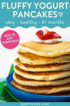 a stack of pancakes with strawberries on top and the words fluffy yogurt pancakes