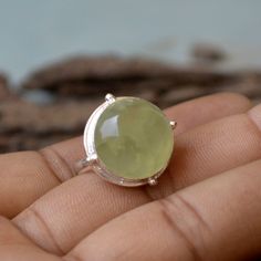 Natural Prehnite Gemstone Ring, 925 Sterling Silver Prehnite Ring, Unique Bezel Work Ring, Statement Gift Ring ,Cabochon Prehnite Round Ring Native=04 --------------------------------------------------------------------- Green Prehnite helps you to connect to beings on the higher spiritual planes, and enhances spiritual growth. This lovely stone has an energy that helps you to be prepared, as it enhances precognition or prior knowledge of an event, and the gift of prophecy. By its action of link Green Sterling Silver Moonstone Ring, Green Moonstone Ring In Sterling Silver, Prehnite Ring Jewelry Gift, Epidote In Prehnite Ring, Green Cabochon Moonstone Ring, Green Prehnite Round Jewelry, Green Cabochon Moonstone Ring In Sterling Silver, Round Green Prehnite Jewelry, Silver Turquoise Ring With Cabochon Chrysoprase