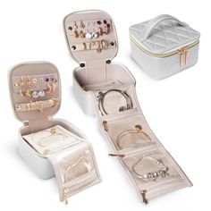 three jewelry boxes with different types of rings and bracelets in them on a white background